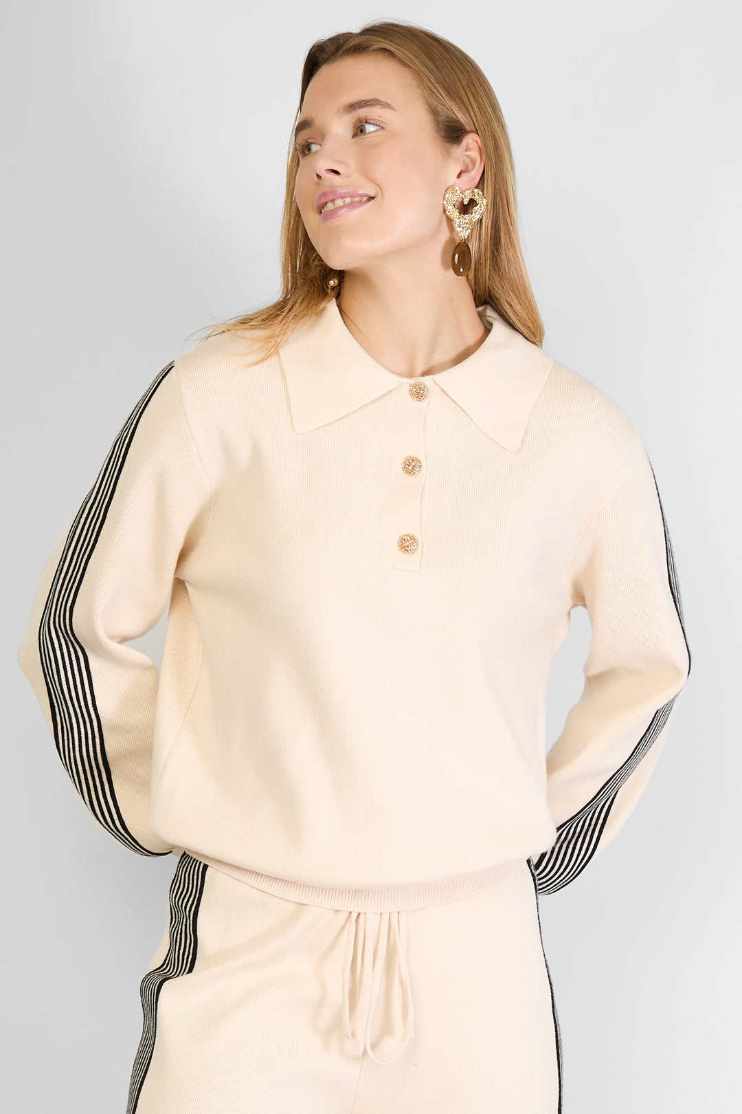 Knitted sweater with stripes