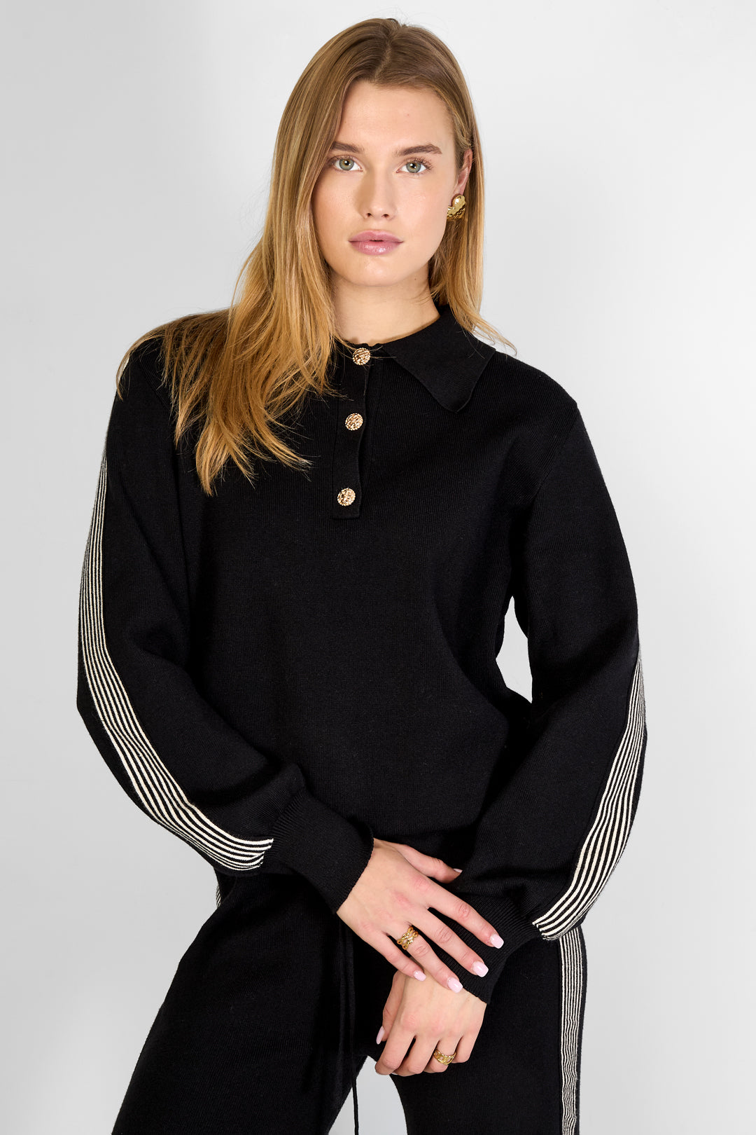 Knitted sweater with stripes